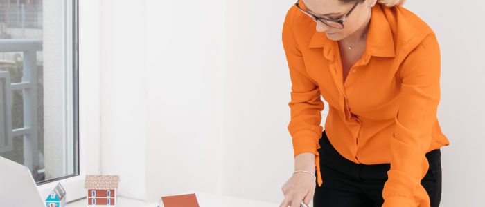 female-architecture-inspecting-blueprint-desk-office female-architecture-inspecting-blueprint-desk-office