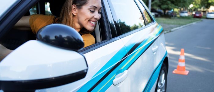 woman-learning-drive-car-going-reverse woman-learning-drive-car-going-reverse